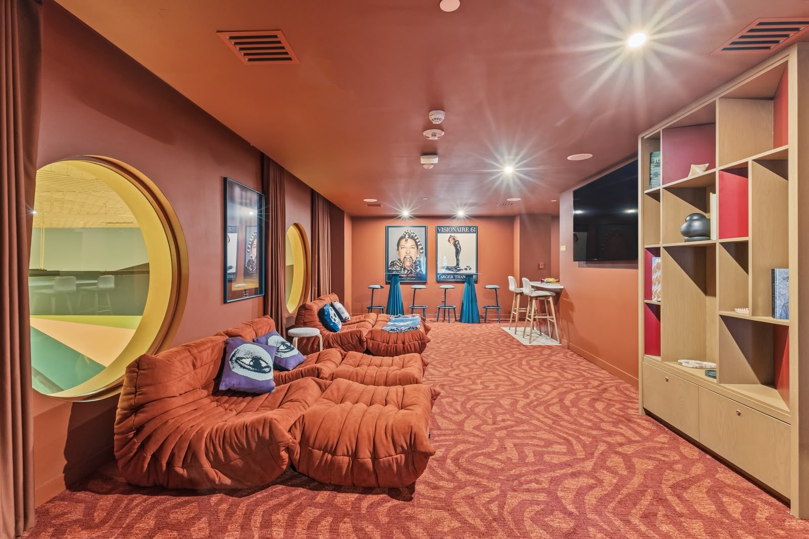 Private screening room with tiered lounge seating