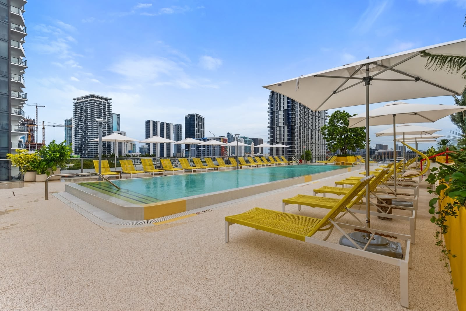 Rooftop pool deck with wide skyline view