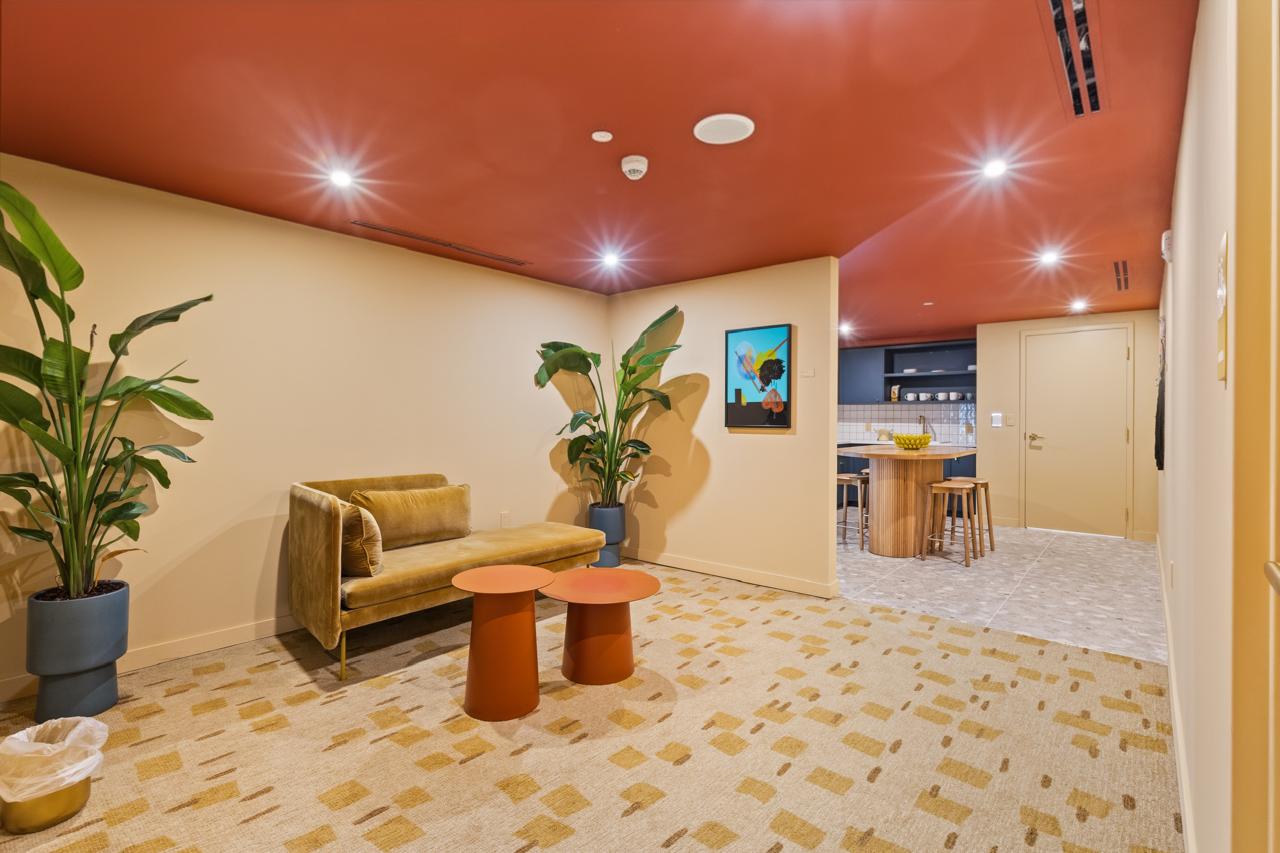 Resident lounge adjacent to shared kitchen